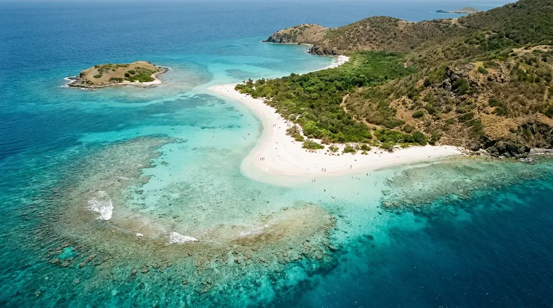 An aerial of a reef-fringed Caribbean coastline