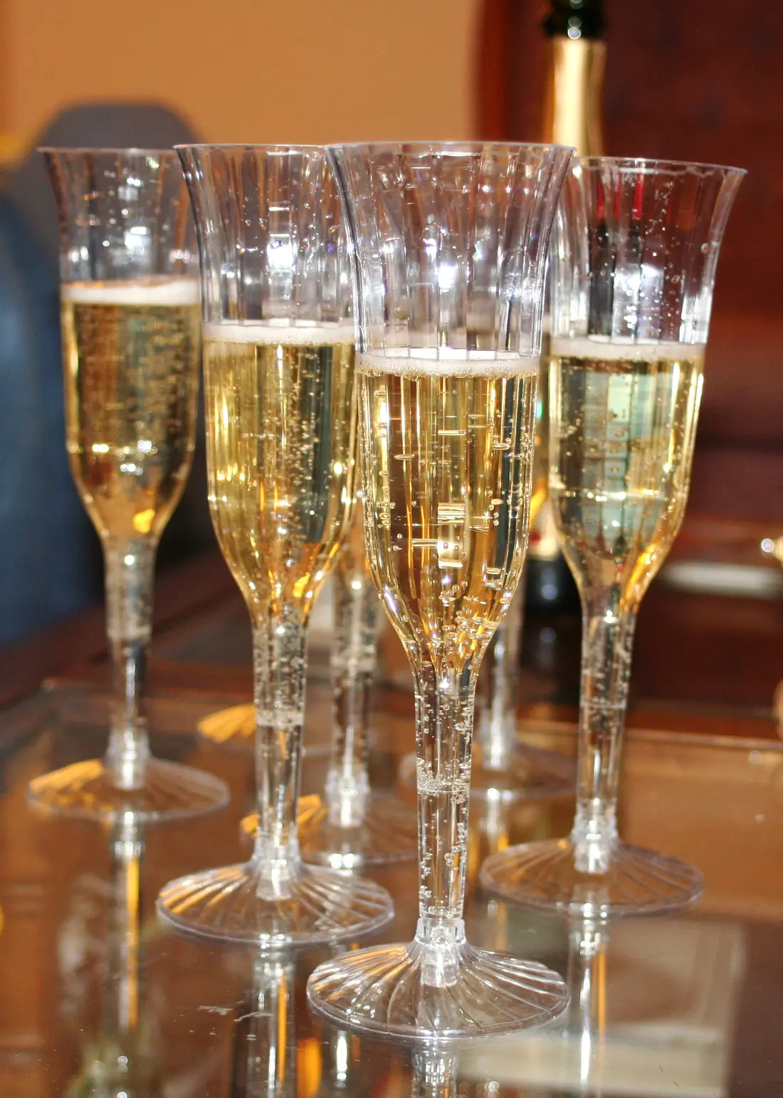 Champagne flutes poured for a toast